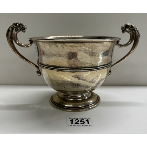 1251 - A silver two handled cup for polo dated 1904 Otter Vale Polo Club. 15.55 oz / 440 grams