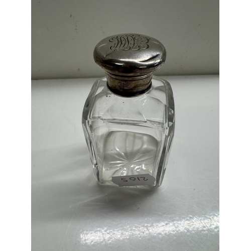 1252 - 2 Silver topped bottles / perfumes & 2 others unmarked.