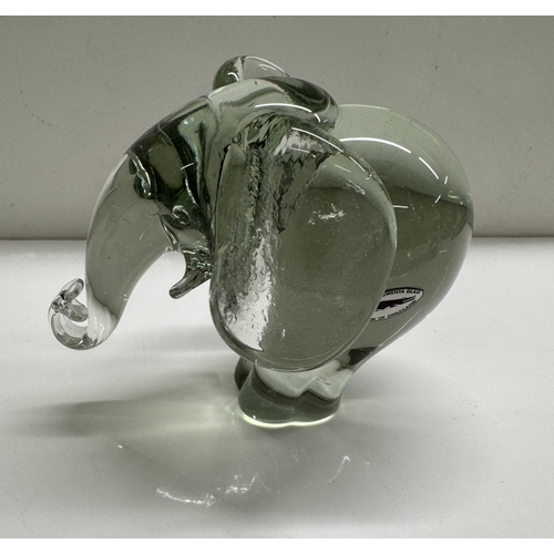 1256 - 4 Heavy glass elephants