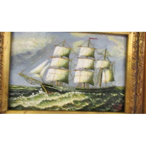 1221 - A gilt framed enhanced print of a tall ship.