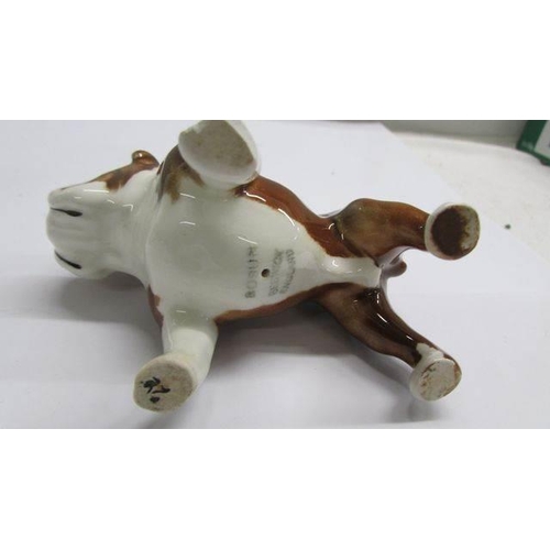 1223 - A Beswick bull dog and a Royal Doulton Terrier.