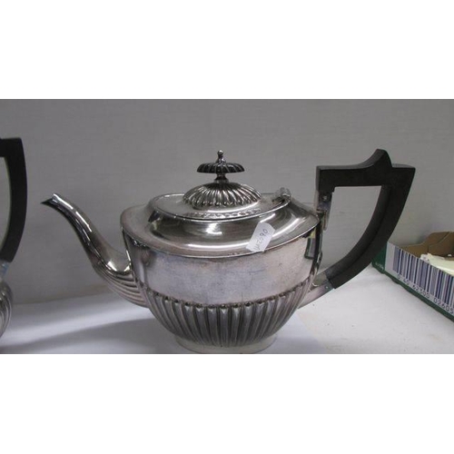 1236 - A Sheffield made silver plate tea set.