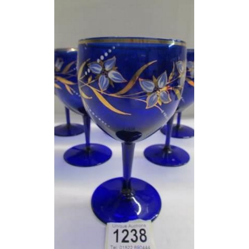 1238 - Six Bohemian style Bristol blue wine glasses.