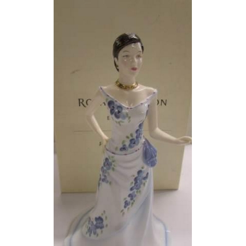 1240 - A Boxed Royal Doulton pretty ladies figurine- Charlotte.