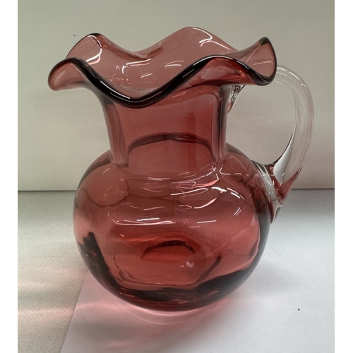 1276 - 3 pieces of cranberry glass