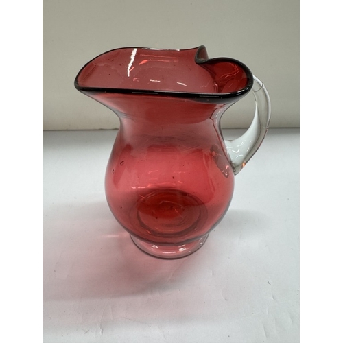 1276 - 3 pieces of cranberry glass