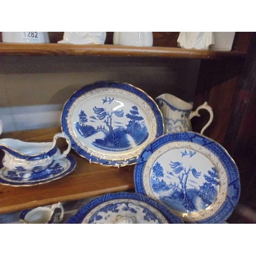 1283 - Approximately 52 pieces of Booths 'Real Old Willow' dinner and tea ware.