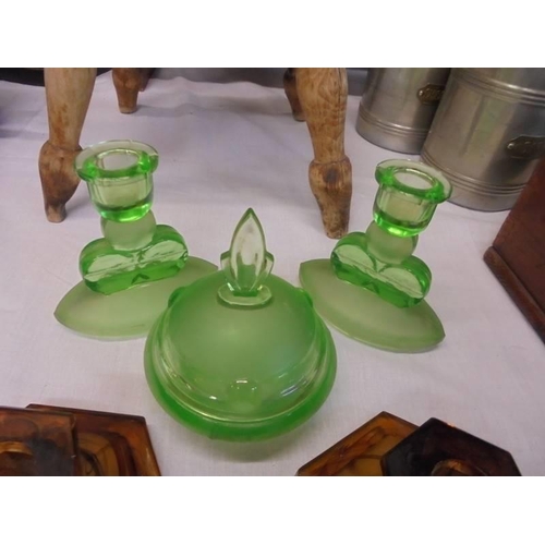 1290 - A pair of 1930's smoke glass candlesticks, pair of green glass candlesticks and a trinket pot.