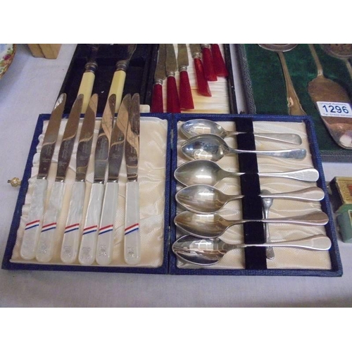 1296 - A quantity of cased cutlery sets and other cutlery.