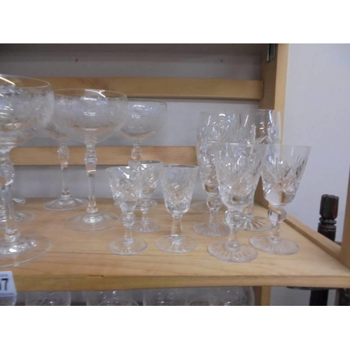 1297 - A set of 6 engraved champagne glasses, 2 sets of 6 engraved wine glasses, 2 sets of 6 crystal sherry... 