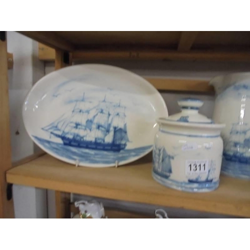 1311 - A collection of Oxney Green nautical pottery - large Seruna plate, two lidded pots and a large jug.