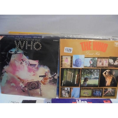 1329 - A collection of LP records including The Who, Journey, Bee Gees, signed IPI Tombi album etc.,