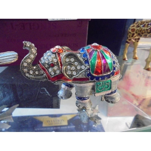 1333 - Three boxed decorative pill boxes as a Giraffe, Bird and Elephant.