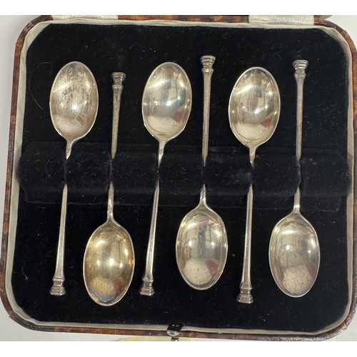 1190A - A cased set of silver spoons etc