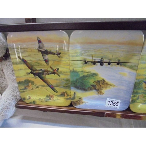 1355 - A set of four 'The Battle of Britain Memorial Flight' plates on stand.