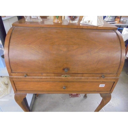 1436 - An early 20th century mahogan dome top bureau on Queen Anne style legs.