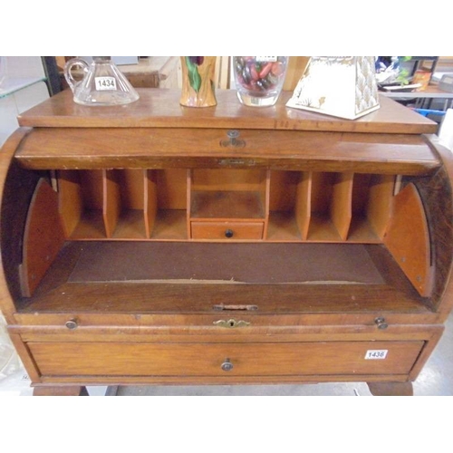 1436 - An early 20th century mahogan dome top bureau on Queen Anne style legs.