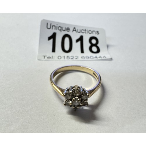 1018 - A gold ring set diamond cluster, size O, 2.39 grams.