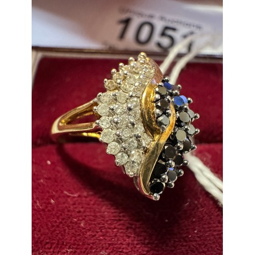 1051 - An exquisite 18ct gold ring set black and white diamonds, size S, 3.22 grams.