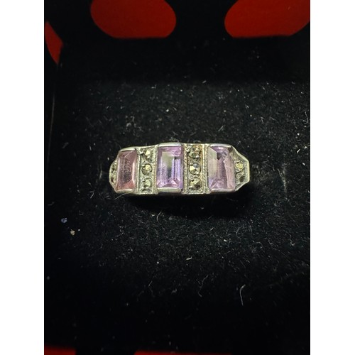 1086 - A vintage amethyst and marcasite silver (925) ring.