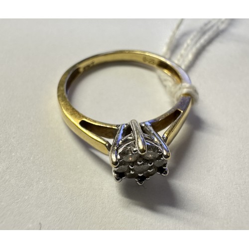 1004 - An 18ct yellow gold seven stone diamond ring, size P, 3.53 grams