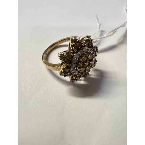 1010 - A 9ct yellow gold floral ring, size N, 4.06 grams.