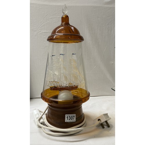 1307 - A table lamp in the form of a glass galleon in a bottle. COLLECT ONLY.