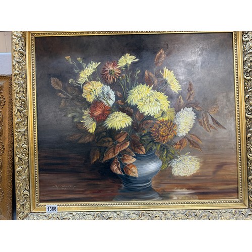 1366 - A gilt framed oil on board painting of a floral arrangement,