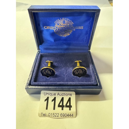 1144 - A boxed pair of Venice Simplon Orient Express cuff links.