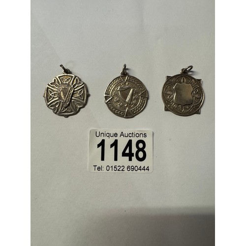 1148 - Two silver watch fobs featuring harps and another silver watch fob.