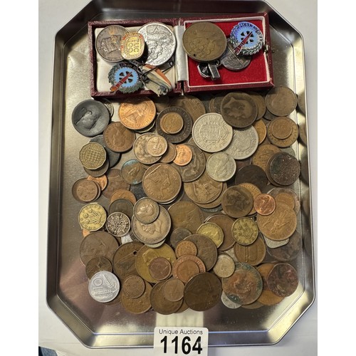 1164 - A mixed lot of coins and badges.