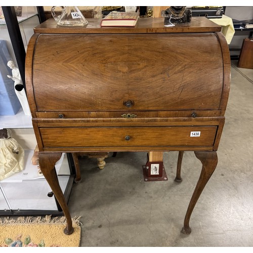 1436 - An early 20th century mahogan dome top bureau on Queen Anne style legs.