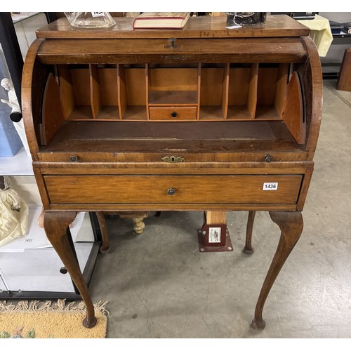 1436 - An early 20th century mahogan dome top bureau on Queen Anne style legs.