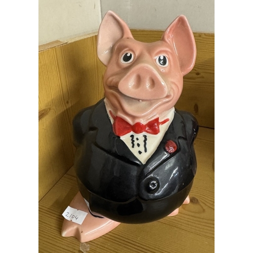 1004 - A quantity of Wade Nat West pig money boxes