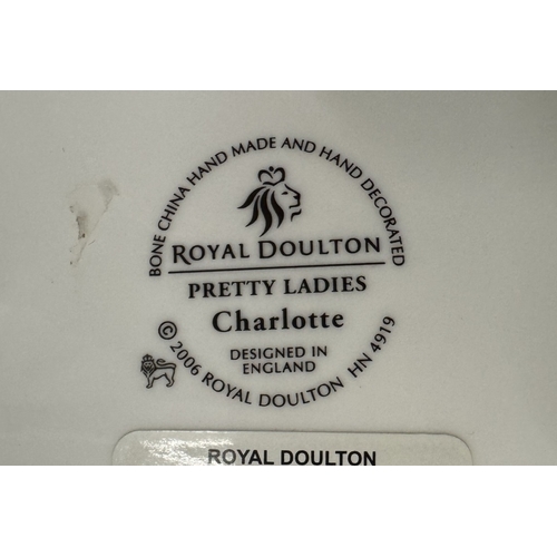 1017 - A Boxed Royal Doulton pretty ladies figurine- Charlotte.