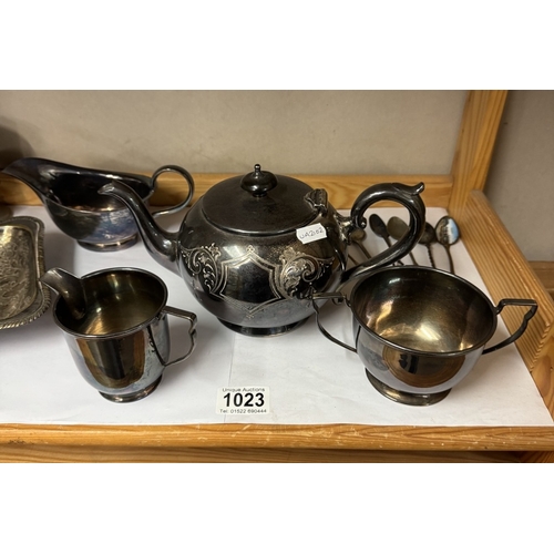 1023 - A quantity of silver plate including tea set