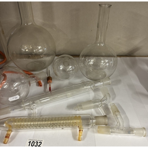 1032 - A selection of quick fit chemistry glassware including bottles