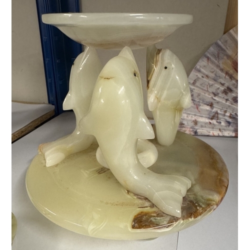 1040 - A marble dolphin tea light stand and a decorative marble clock