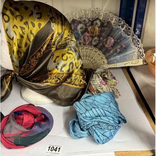 1041 - A quantity of silk scarves etc & 2 fans