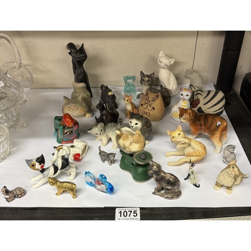 1075 - A good lot of cut glass figures including Goebel