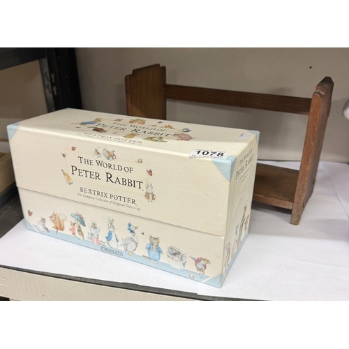 1078 - A boxed set of Beatrix Potter The World Of Peter Rabbit books & A vintage bookshelf