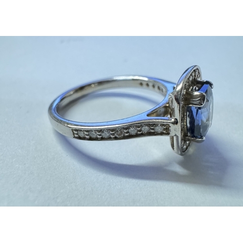 1002 - An 18ct white gold quality sapphire diamond ring. Size M