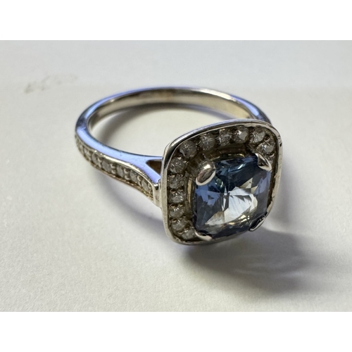 1002 - An 18ct white gold quality sapphire diamond ring. Size M