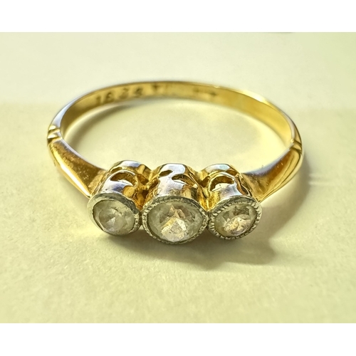 1007 - A yellow gold 3 stone diamond ring. 1.40 grams. Size K