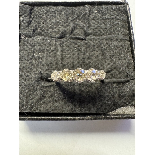 1008 - An 18ct approximately 1ct 5 stone yellow gold diamond ring. Size L