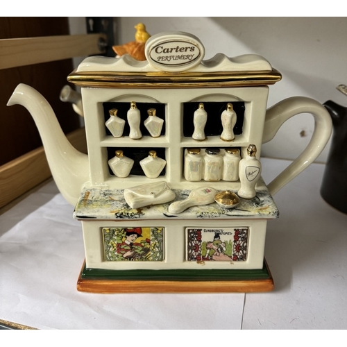 1088 - A quantity of decorative teapots including Carters Perfumery