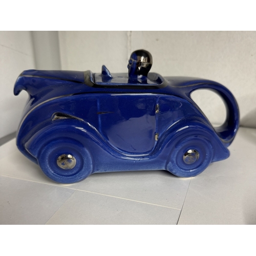 1102 - A Wade lady blow up & A vintage Sadler racing car teapot