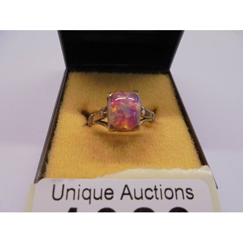 1029 - A 9ct gold ring set multi-coloured stone, size P, 3.9 grams.