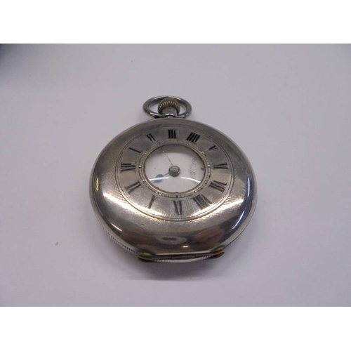 1035 - A 935 silver cased half hunter pocket watch with enamel dial.