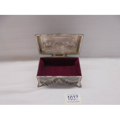 1037 - A good French spelter jewellery casket.